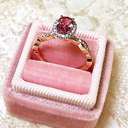 diamond ring with pink gemstone