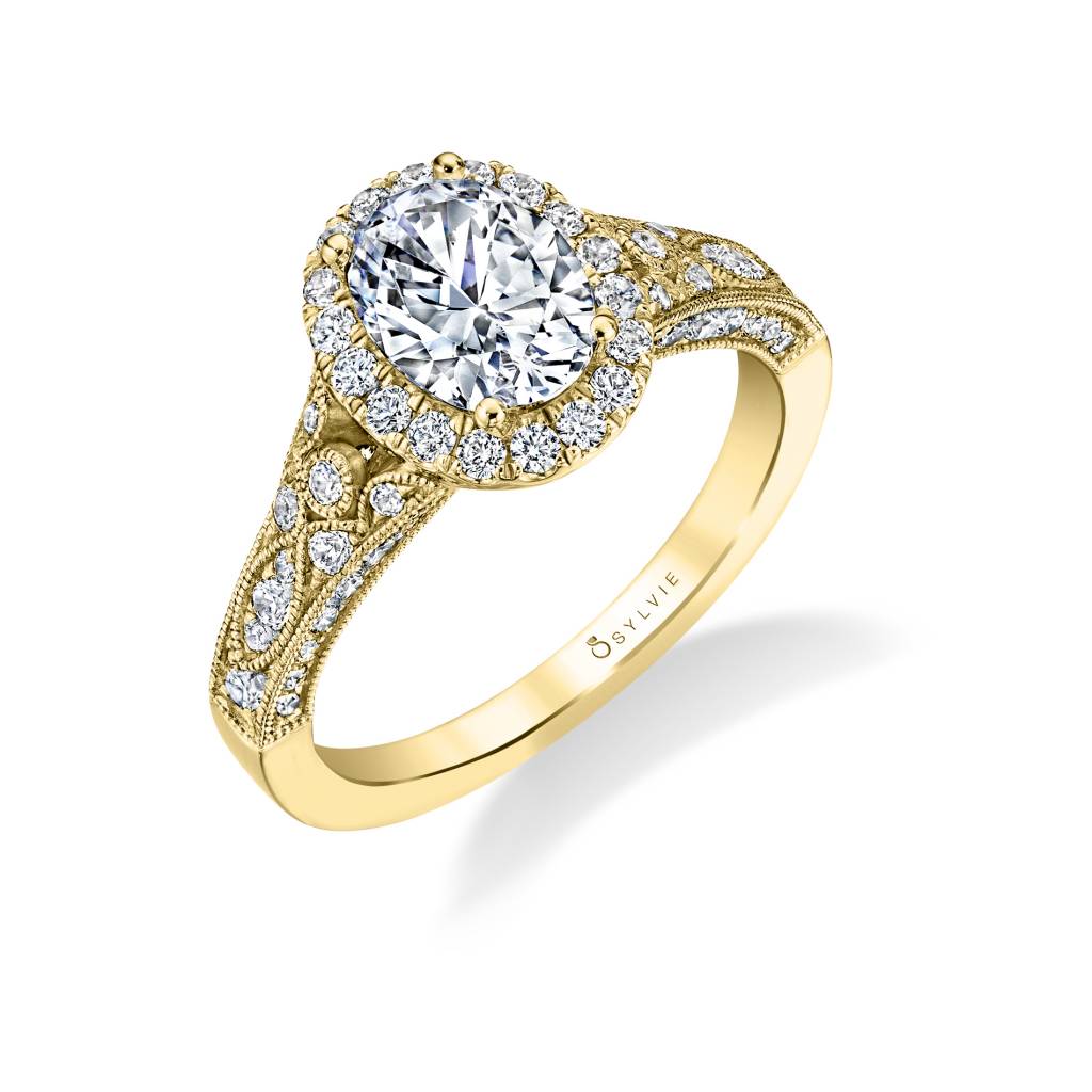 vintage inspired yellow gold oval halo engagement ring