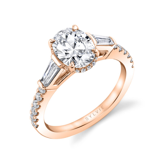 Oval engagement ring with baguettes