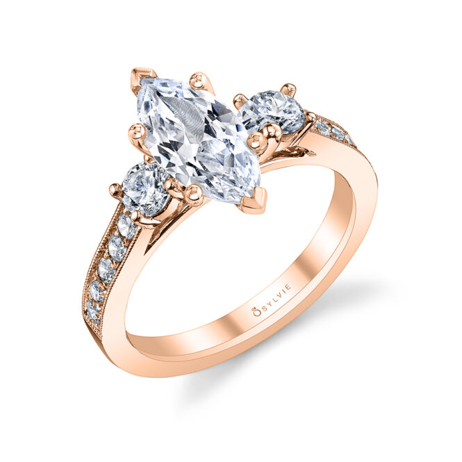 3 stone marquise engagement ring in rose gold