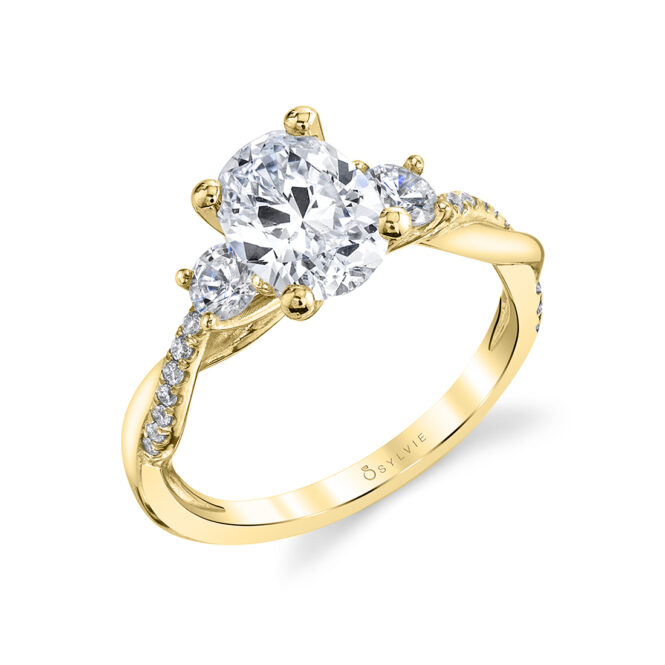 3 stone oval engagement ring with round side stones in yellow gold - Style 