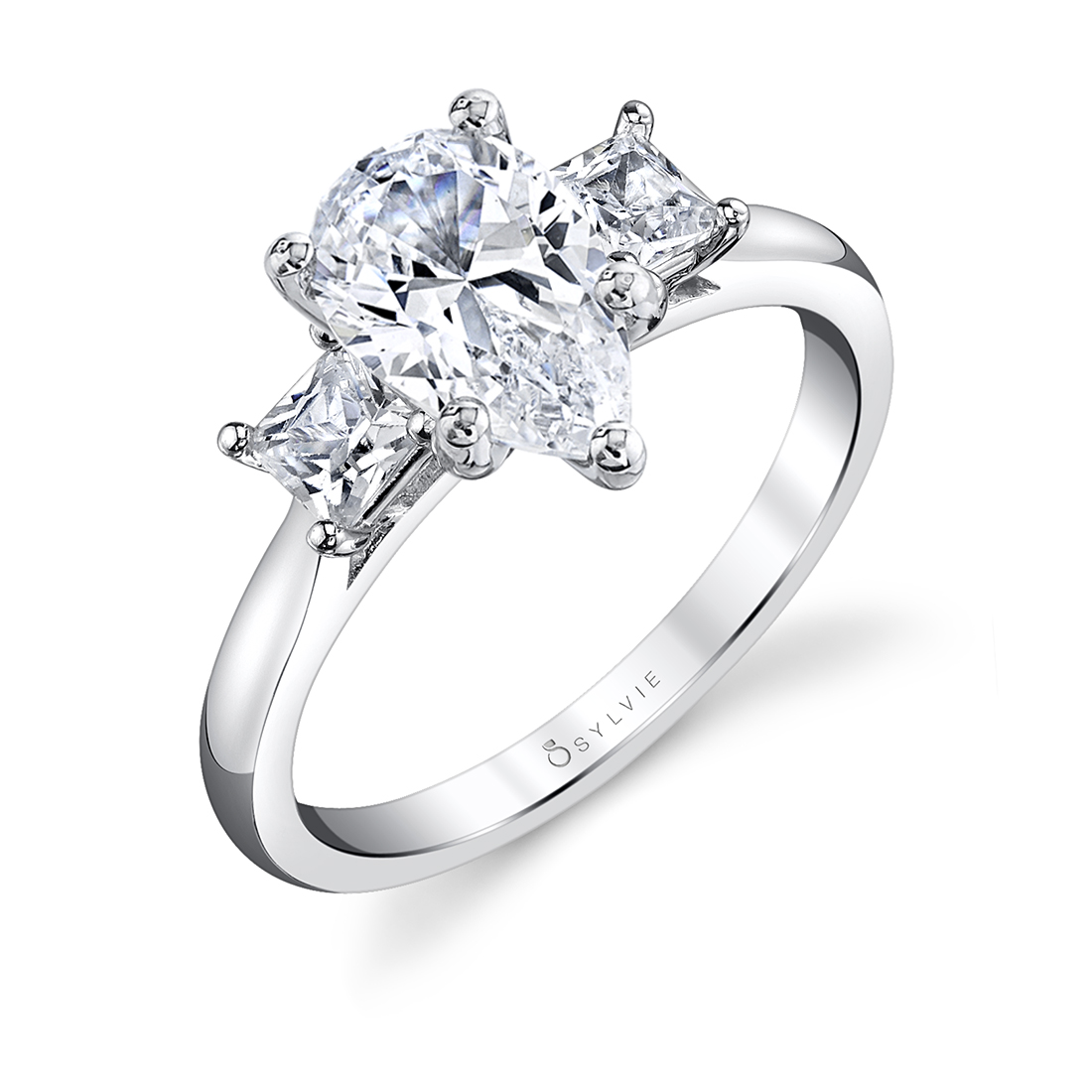 pear cut ring with princess cut side stones in white gold