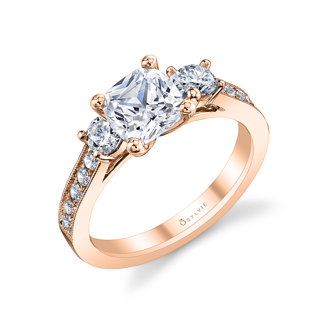 cushion cut 3 stone engagement ring in rose gold