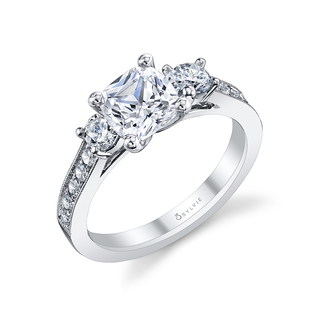 cushion cut 3 stone engagement ring in white gold