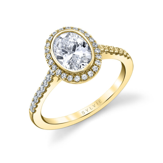 bezel set oval engagement ring in yellow gold