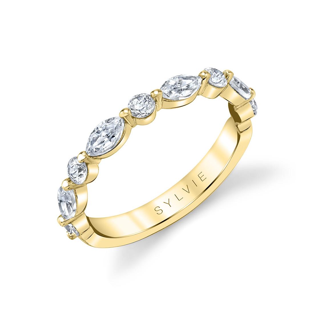 marquise wedding band with shared prongs in yellow gold
