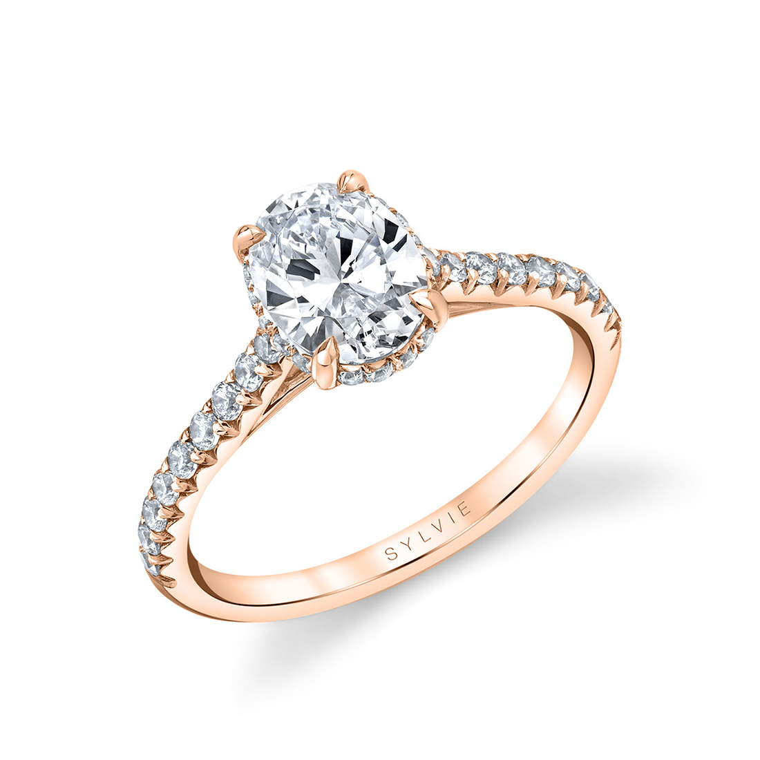 oval engagement ring with hidden halo in rose gold