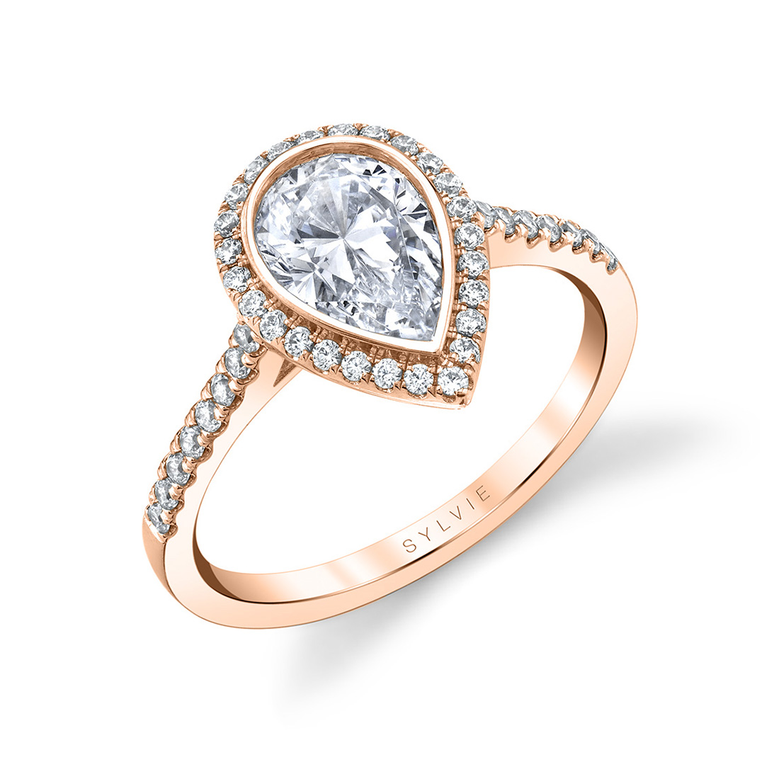 pear shaped bezel set engagement ring in rose gold
