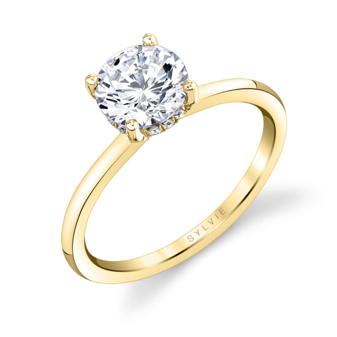 hidden halo engagement ring with plain band in yellow gold