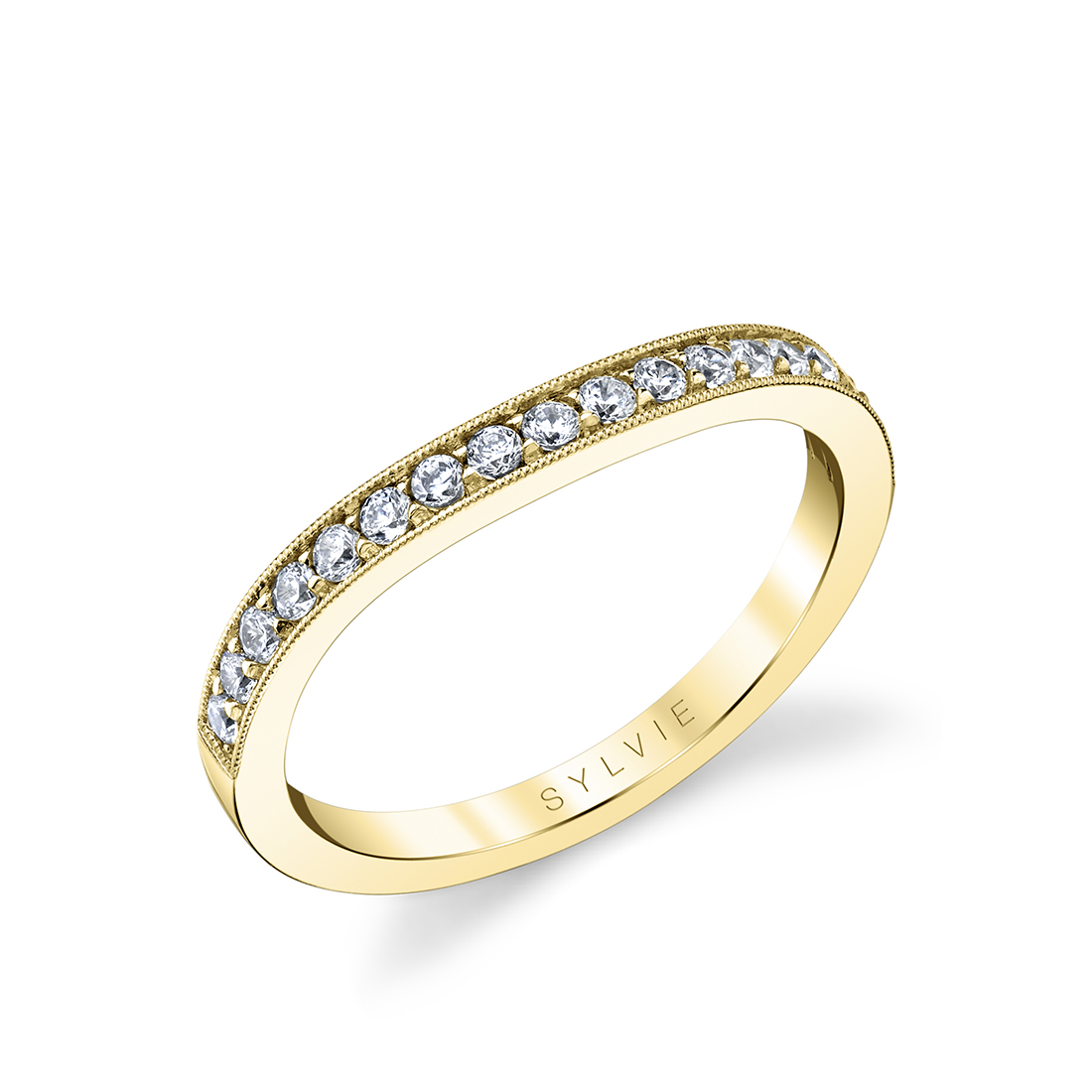 channel set wedding band with milgrain detail in yellow gold