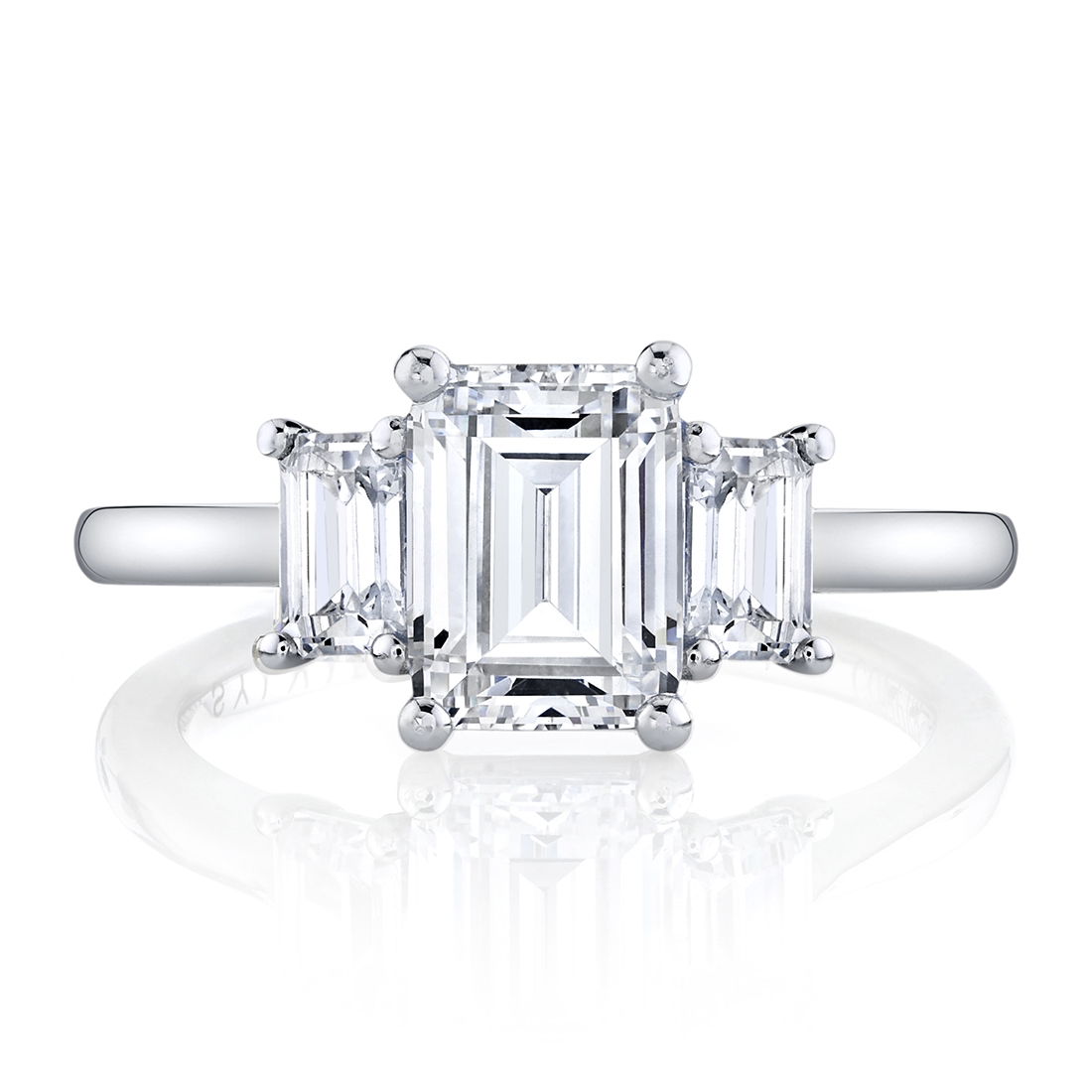 emerald cut engagement ring with emerald side stones