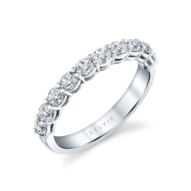 white gold oval shaped east to west wedding ring