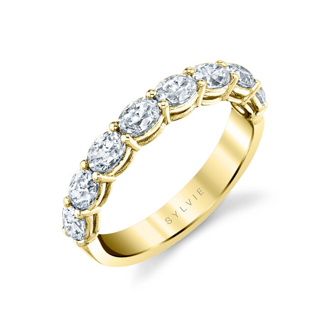 yellow gold oval shaped east to west wedding ring b101