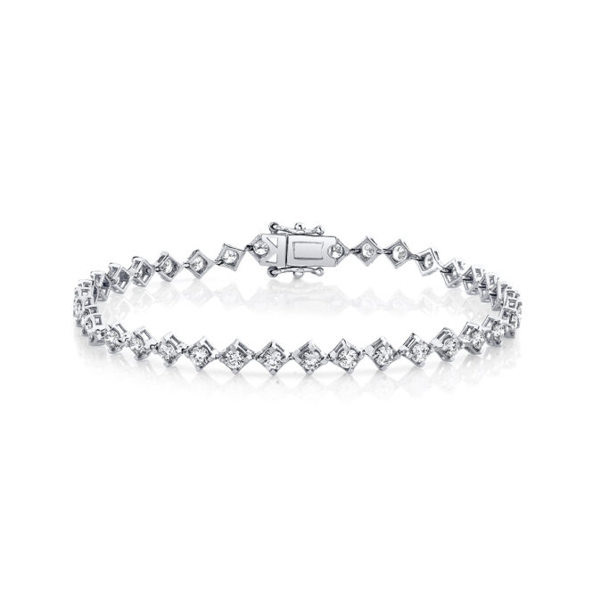 white gold four prong offset diamond bracelet