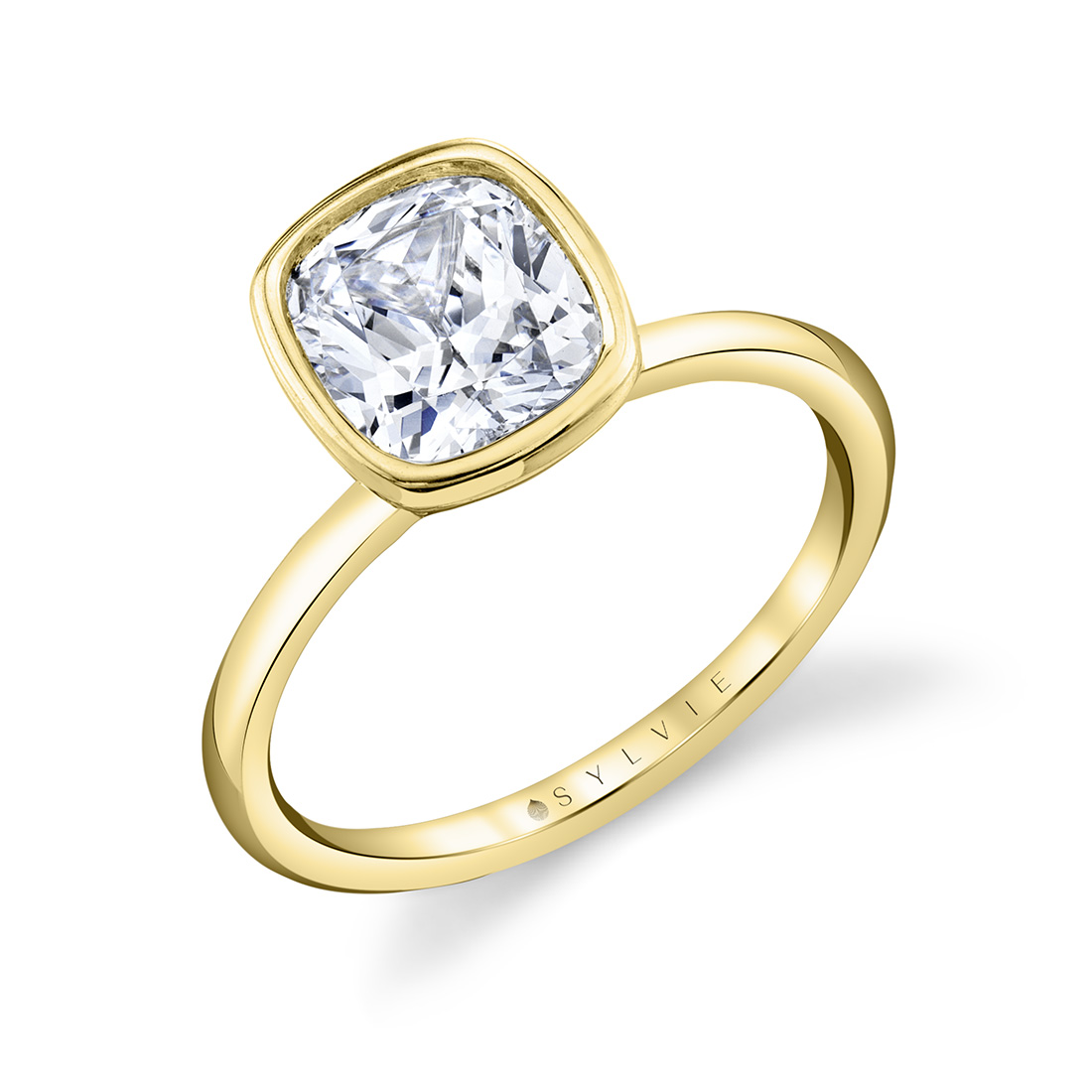 yellow gold cushion cut bezel set engagement ring