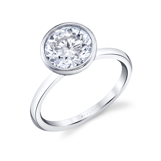 white gold round bezel set engagement ring