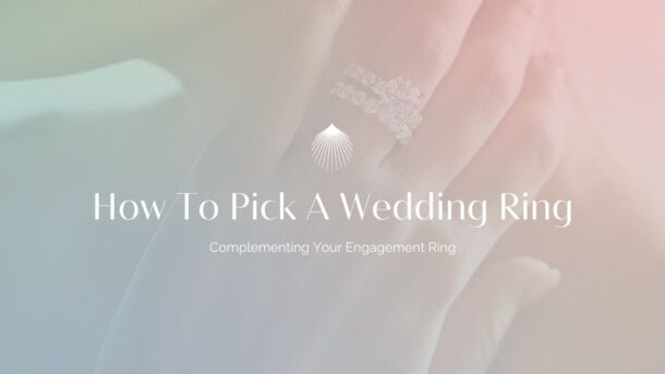 woman wearing bridal set with a single prong classic engagement ring and matching classic wedding ring