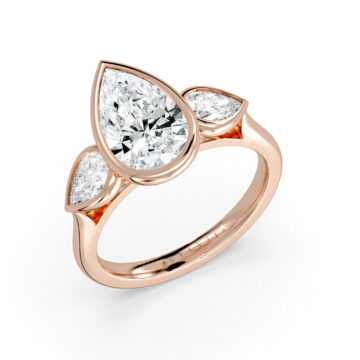 Yellow Gold Pear Shaped Bezel Three Stone Engagement Ring - Delta