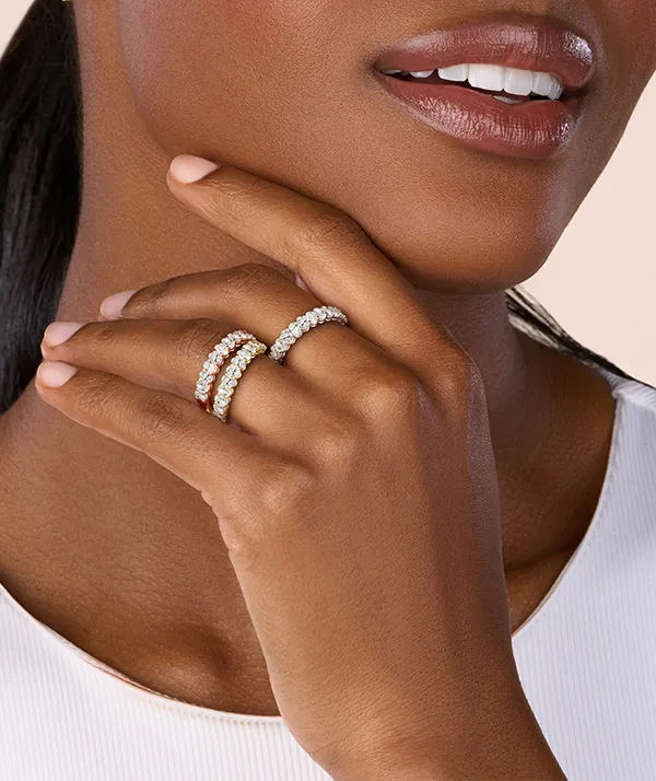 Engagement ring with a diamond on the elegant hand of a beautiful girl.  Stock Photo | Adobe Stock