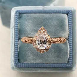 rosegold and diamond ring in velvet box