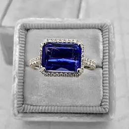 emerald cut sapphire and diamond ring