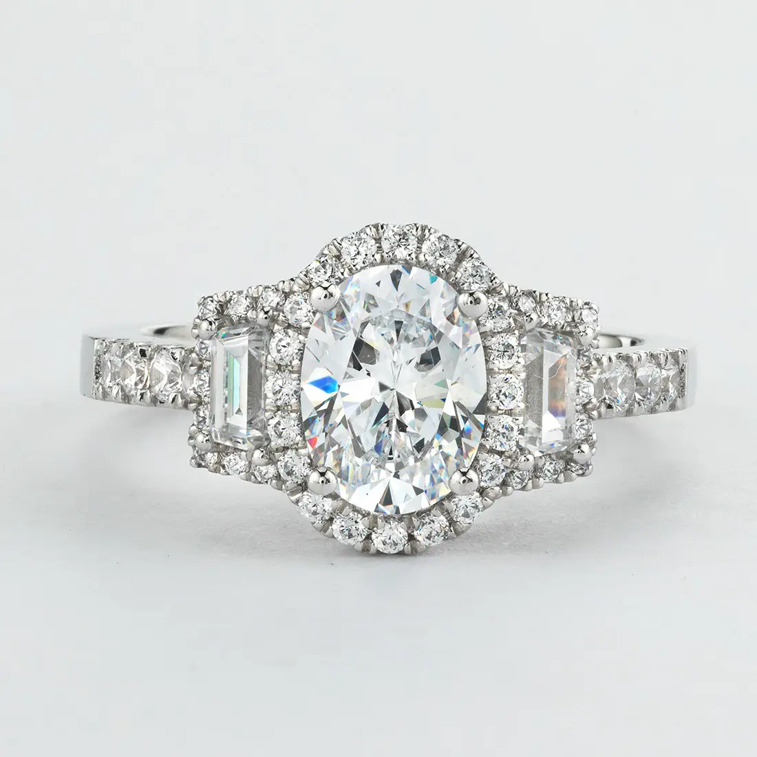 White Gold Oval Cut Three Stone Halo Engagement Ring with Baguettes - Vicky