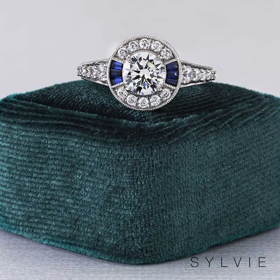round blue sapphire and diamond engagement ring