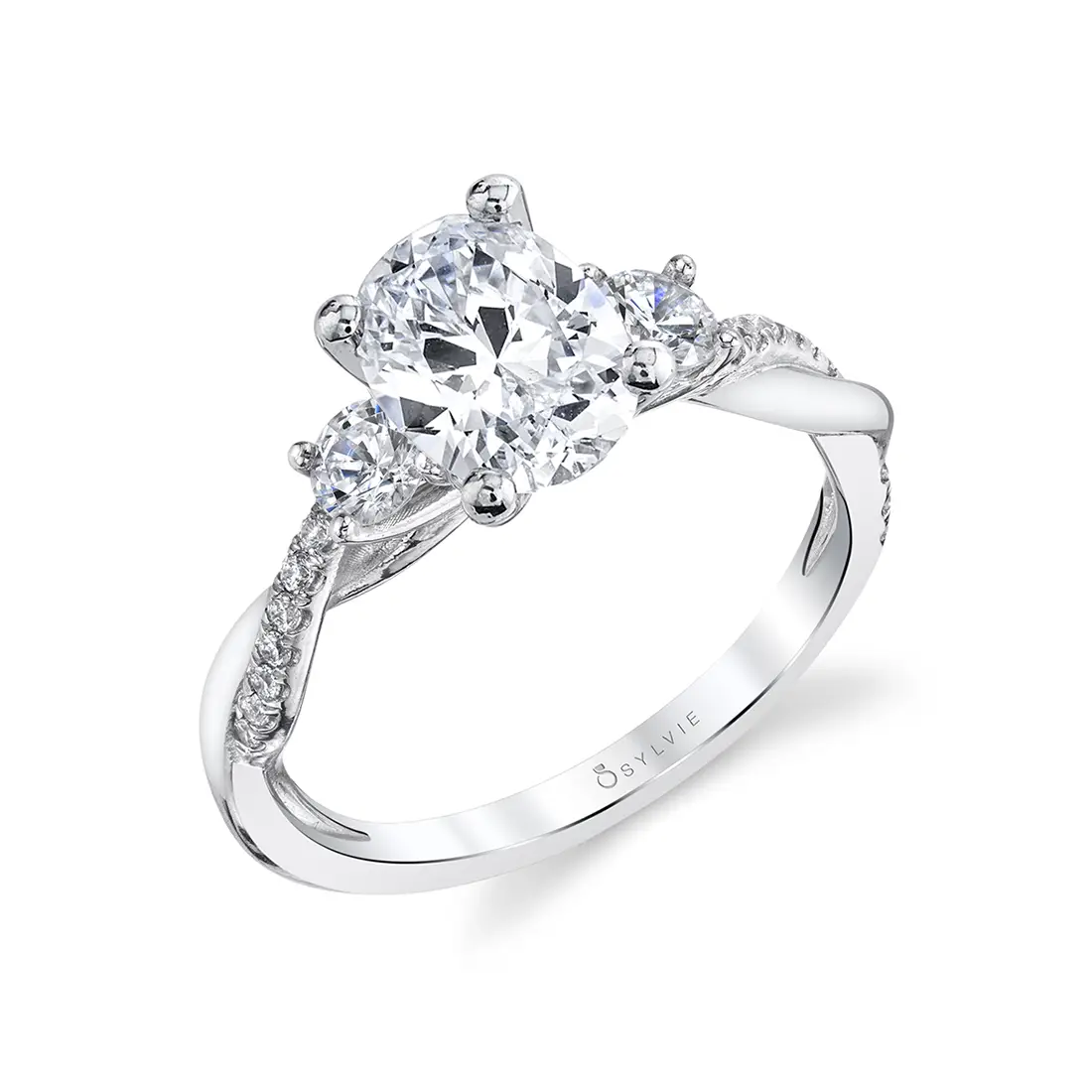 3 stone oval engagement ring with round side stones in white gold