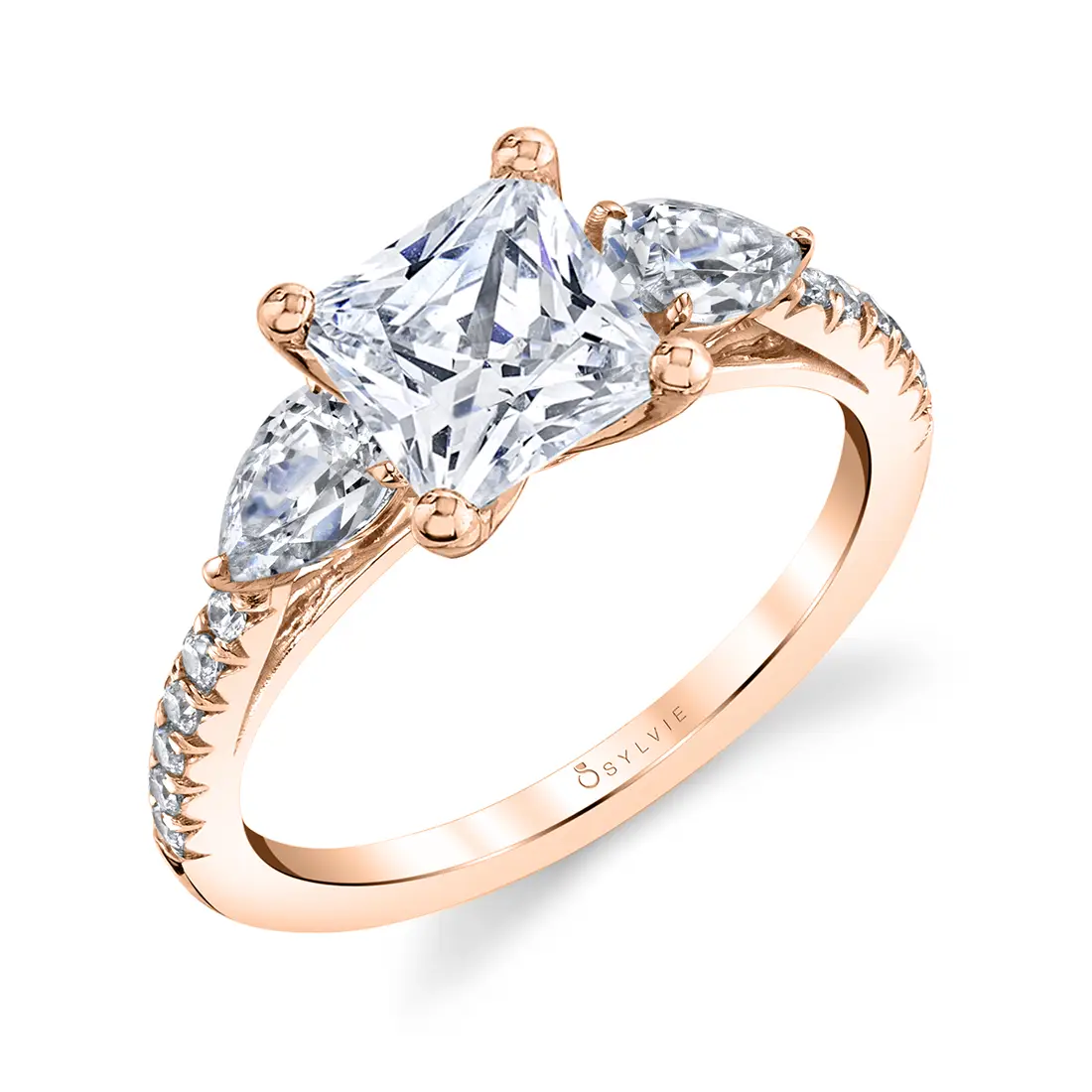 three stone princess cut engagement ring with pear side stones in rose gold