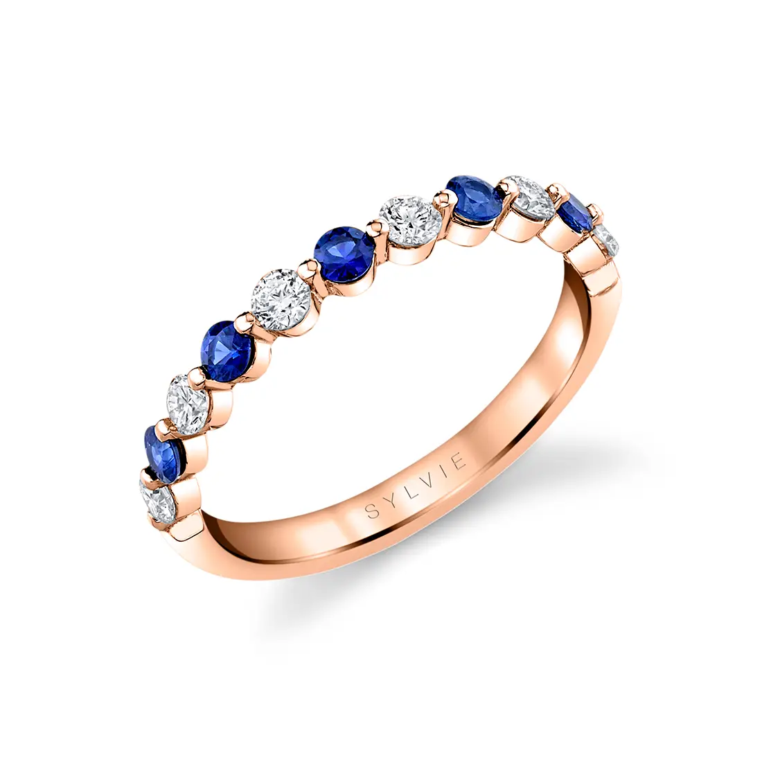 blue sapphire and diamond wedding band in rose gold