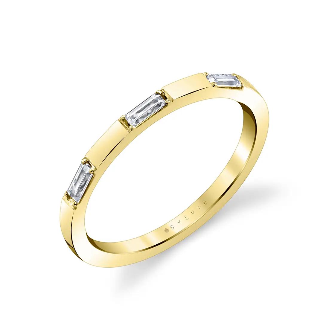 modern baguette wedding band in yellow gold