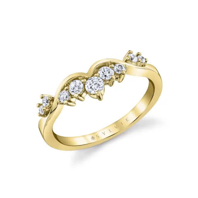 curved diamond wedding band in yellow gold