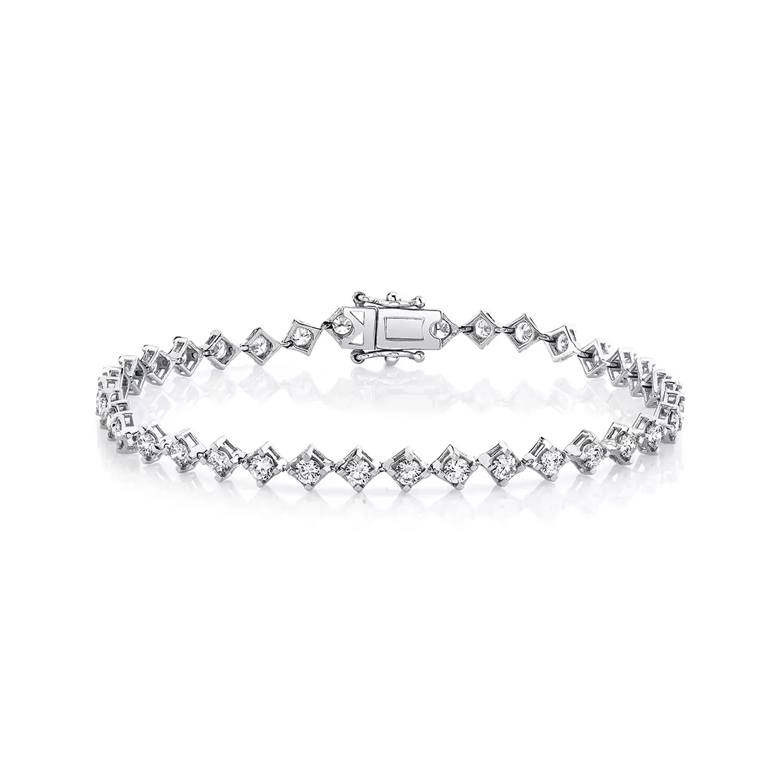 white gold four prong offset diamond bracelet