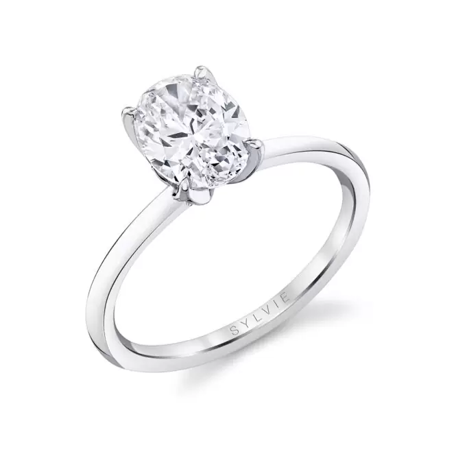 white gold oval cut floral inspired solitaire engagement ring