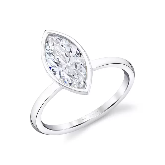 white gold marquise cut bezel set engagement ring