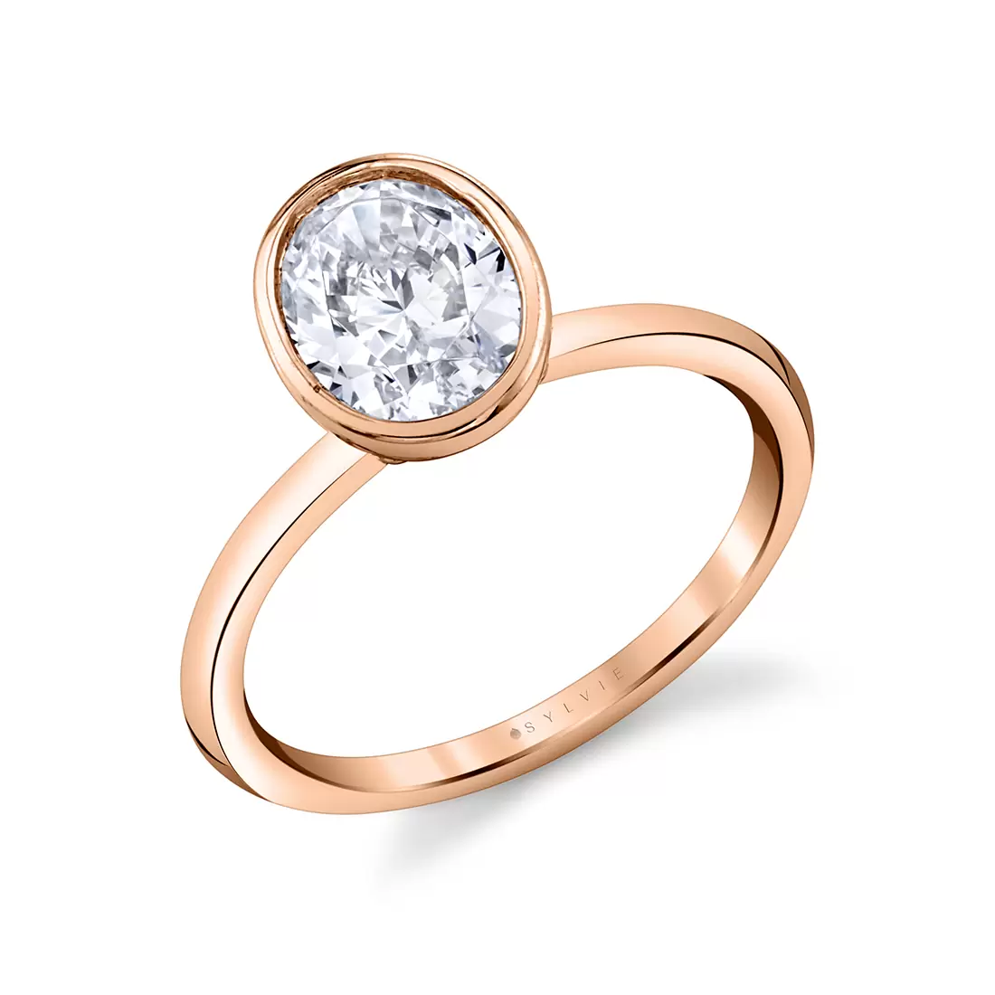 rose gold oval cut bezel set engagement ring