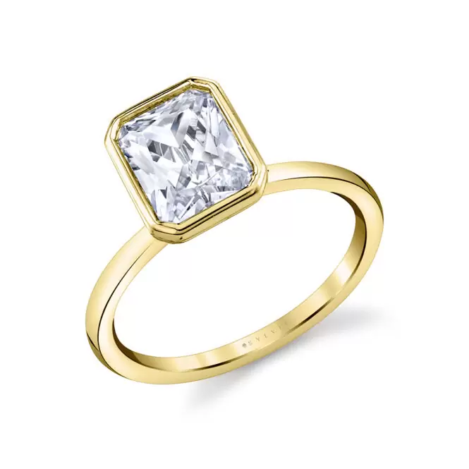 yellow gold radiant cut bezel set engagement ring