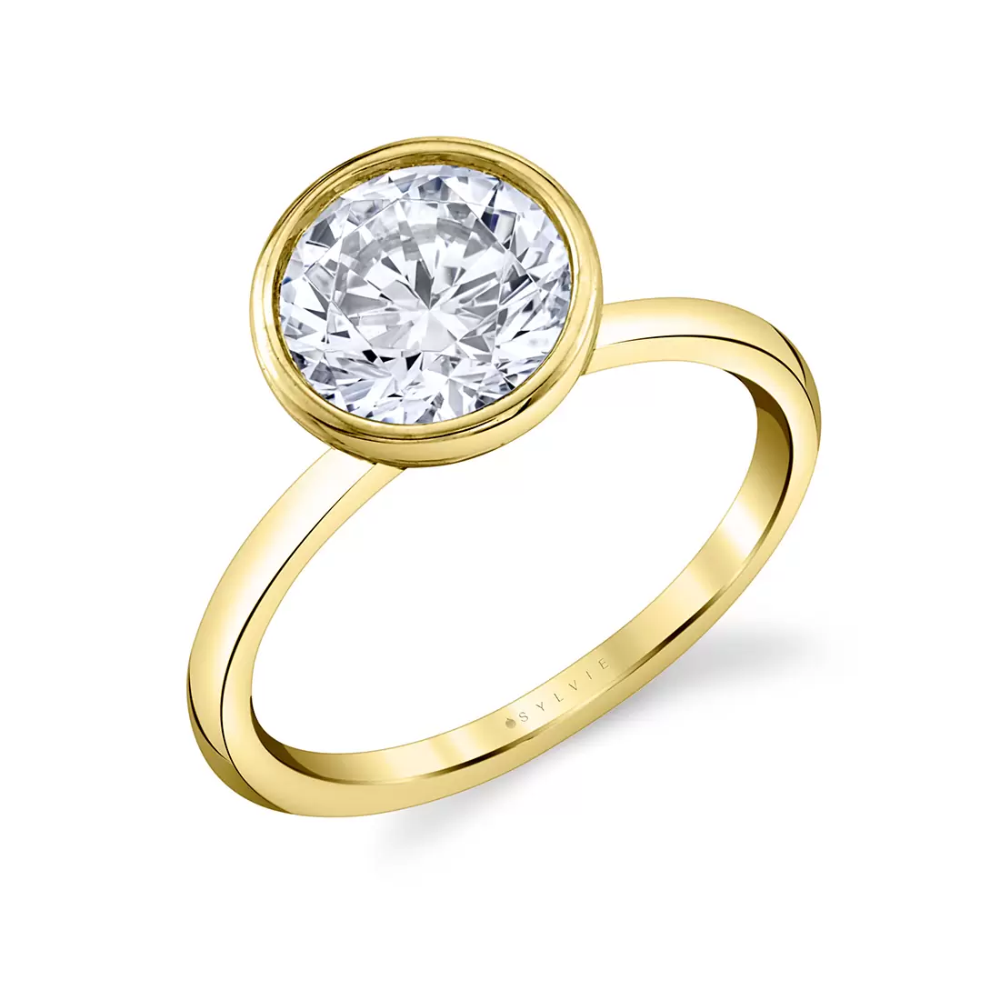 yellow gold round bezel set engagement ring