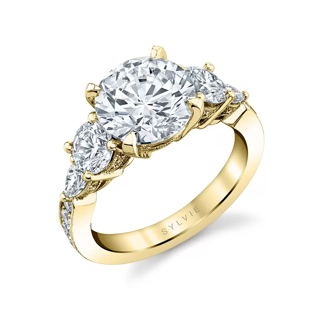 yellow gold three stone engagement ring