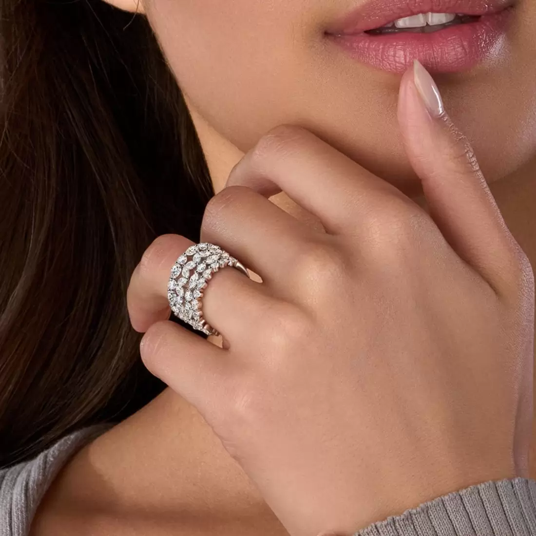 woman wearing a stack of eternity rings