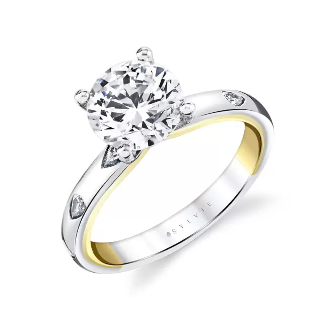 two tone flush set pear engagement ring